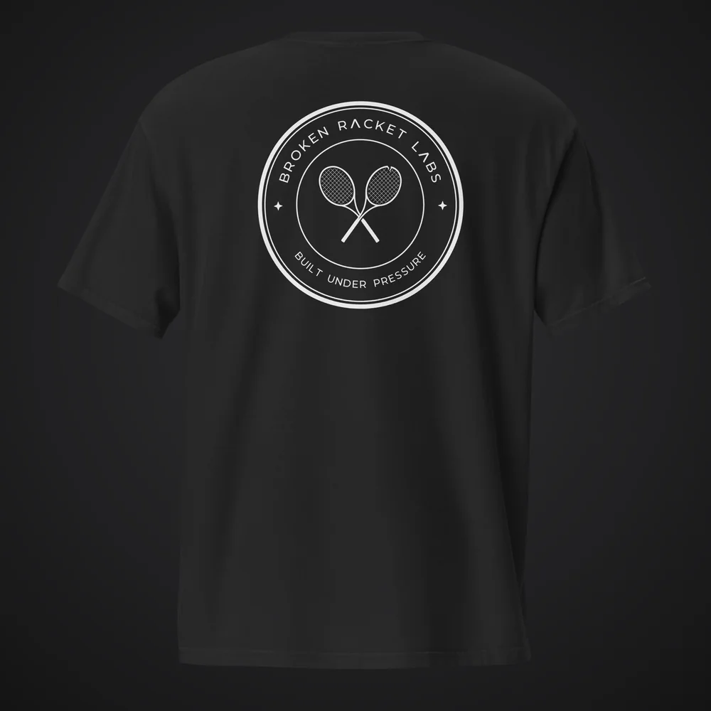 The After Hours Tee in black, back, with the white Broken Racket Labs seal
