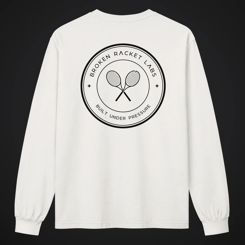 The Day Shift in vintage white, back, with the black Broken Racket Labs seal
