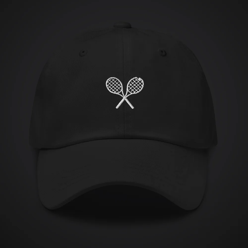The Lab Cap in black with white rackets crossed-racket embroidery