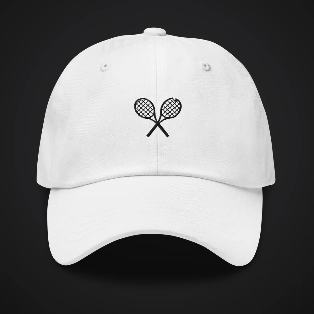 The Lab Cap in white with black rackets crossed-racket embroidery