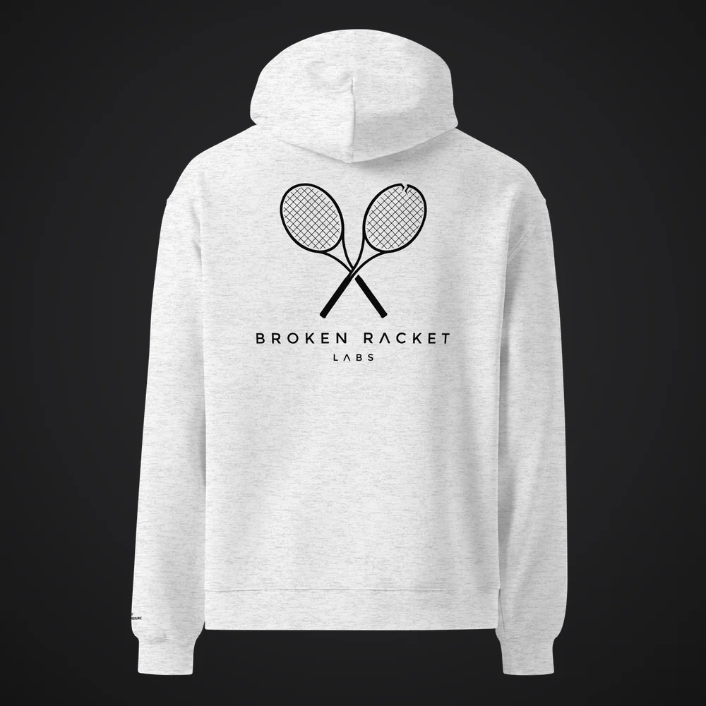 The Lab Coat in white heather, back, with the black Broken Racket Labs lockup