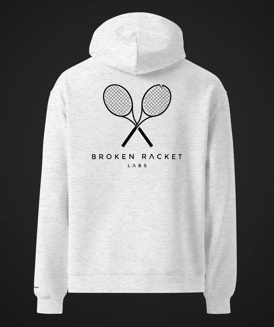 The Lab Coat in white heather, back view with the black Broken Racket Labs lockup